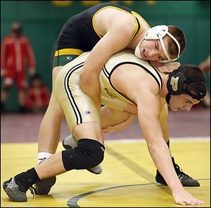 Clay freshman Matt Stencel controls Perrysburg's Kadin Llewellyn to win the 182-pound final at the Maumee Bay Classic. Stencel  is 20-5 this year.