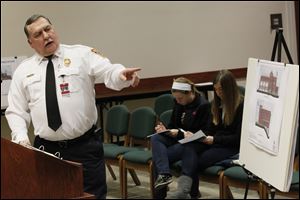 Sylvania Township fire chief Jeff Kowalski presents the proposed blueprints for a new Fire Station No. 1 to the Sylvania City Council Tuesday evening in Sylvania.
