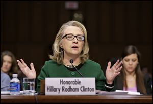 Secretary of State Hillary Rodham testifies on Capitol Hill in Washington. 