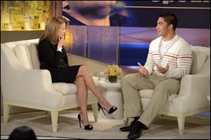 Notre Dame linebacker Manti Te'o, right, speaks with host Katie Couric during an interview for 