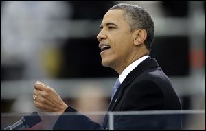 President Barack Obama delivers his Inaugural address at the ceremonial swearing-in at the U.S. Capitol during the 57th Presidential Inauguration in Washington, Monday.