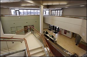 The interior of the new cancer center offers a cheerier, more soothing atmosphere.