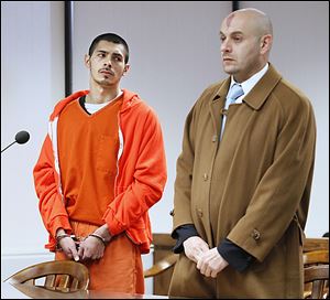 Jose Moya, Jr., left, appears in Wood County Common Pleas Court in Bowling Green with attorney Omar Shaaban. Moya, accused in the July 22 death of Leandra Frankum, is charged with murder and tampering with evidence.  
