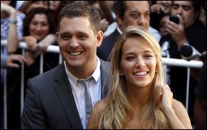 Canadian jazz singer Michael Buble and his Argentinian actress wife, Luisana Lopilato, are expecting their first baby together, 
