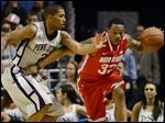  Ohio State's Lenzelle Smith Jr. (32) works past Penn State's D.J Newbill (2) during the first half of an NCAA college basketball game in State College, Pa.