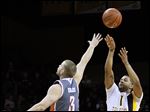 UT guard Dominique Buckley, who led the Rockets with 20 points, shoots a 3-point-shot against Bowling Green's Luke Kraus in Saturday night's game at Savage Arena.