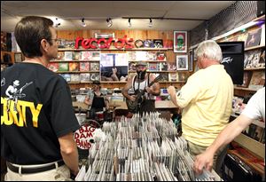 Reverend Peyton's Big Damn Band plays an in-store concert at Culture Clash on Secor Rd.