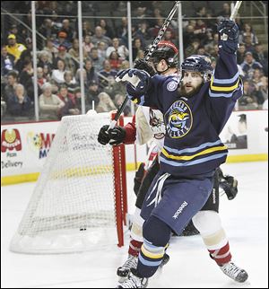 Toledo's Cody Lampl celebrates after scoring a goal to put the Walleye ahead during the first period. His goal helped Toledo to a 5-1 victory over Bakersfield.