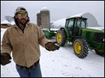  Shawn Georgetti pauses on his 167 acre family dairy farm, Saturday in Avella, Pa. With royalties from a Range Resources gas well on his property Georgetti has been able to buy newer farm equipment that's bigger, faster, and more fuel-efficient.