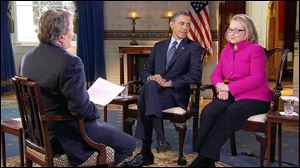 In this image taken from video, President Obama and Secretary of State Hillary Clinton speak with correspondent Steve Kroft during an interview for CBS’ ‘60 Minutes.’