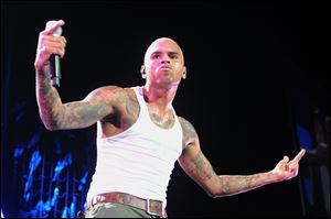 Chris Brown performs live as part of the F.A.M.E Tour at The Staples Center in Los Angeles in 2011.
