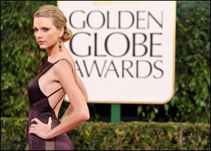Singer Taylor Swift this month at the 70th Annual Golden Globe Awards, shows bolder choices in attire.