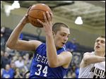  Anthony Wayne's Mark Donnal grabs a rebound against Perrysburg. The 6-foot-9 senior averages 19.5 points and 10.8 rebounds for the Generals (13-2, 8-1 NLL).