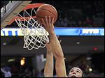  Ohio State's Aaron Craft shoots over Wisconsin's Sam Dekker during the second half of Tuesday's game in Columbus. Craft finished with 13 points.