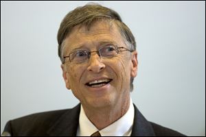 Bill Gates, founder of the software company Microsoft, speaks during a new  conference after a meeting with German Development Aid Minster Dirk Niebel, unseen, in Berlin, Germany, today.