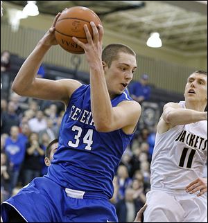 Anthony Wayne's Mark Donnal grabs a rebound against Perrysburg. The 6-foot-9 senior averages 19.5 points and 10.8 rebounds for the Generals (13-2, 8-1 NLL).