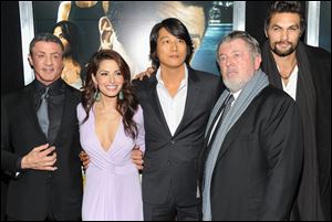 Walter Hill, second from right, continued to produce movies for other people, but seemed destined never to direct another one himself. Then Sylvester Stallone, left, called.
