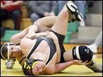  Clay's Jarred Gray pinned Perrysburg's Mark Delas in 3 minutes, 45 seconds to win the 220-pound match Wednesday night.