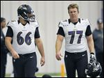  Gino Gradkowski, left, walks with Baltimore teammate Matt Birk. The rookie center, the brother of former UT standout Bruce Gradkowksi,  was drafted by the Ravens in the fourth round.