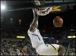  Michigan forward Glenn Robinson III dunks against Northwestern on Wednesday. Robinson scored 13 points on 6-of-7 shooting.