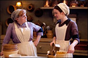 From left to right: Lesley Nicol as Mrs. Patmore and Sophie McShera as Daisy.