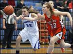  Southview’s Taryn Stanley, right, knocks the ball away from  Anthony Wayne’s McKenzie Krieg  during the Cougars’ 56-49 victory over the Generals on Thursday night. Stanley led Southview with a game-high 20 points as the Cougars improved to 9-2 in the NLL.