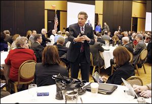 Ohio Gov. John Kasich leaves the podium as he speaks at a special meeting of the Buckeye Association of School Administrators on Thursday in Columbus. 