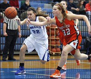 Southview’s Taryn Stanley, right, knocks the ball away from  Anthony Wayne’s McKenzie Krieg  during the Cougars’ 56-49 victory over the Generals on Thursday night. Stanley led Southview with a game-high 20 points as the Cougars improved to 9-2 in the NLL.