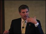  David Brandon, University of Michigan athletic director and guest speaker at the KeyBank Global Leaders Forum, tells businesses to embrace sudden change, just as legendary coach Bo Schembechler taught him.