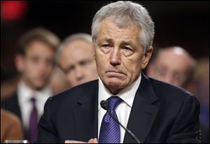 Republican Chuck Hagel, President Obama's choice for defense secretary, testifies before the Senate Armed Services Committee during his confirmation hearing, on Capitol Hill in Washington, Thursday.