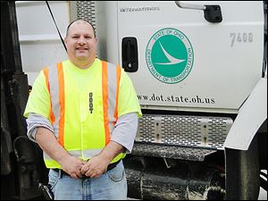 George Seambos, an Ohio Department of Transportation employee, blocked northbound U.S. 23 at the Michigan border Jan. 26, forcing a wrong-way driver into the proper lanes. 