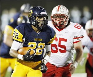 Former Whitmer standout LeRoy Alexander, left, became the main focus of the Ohio High School Athletic Association’s inquiry into Washington Local Schools over the use of ineligible players.