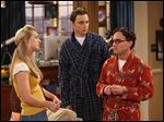 Penny (Kaley Cuoco, left) is surprised when she finds Leonard (Johnny Galecki, right) and Sheldon (Jim Parsons, center) competing for the attention of a famous female physicist, on The Big Bang Theory.