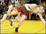  Clay's Richie Screptock, left, won a 6-1 de­ci­sion against Cen­tral Catholic soph­o­more Josh Moss­ing. Screp­tock won the TRAC’s 113-pound ti­tle a year ago, also beat­ing Moss­ing in that fi­nal.