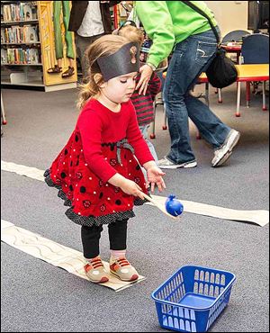 Sophia Witham - Age 2 - daughter of Dan and Lori Witham - playing walk the plank.