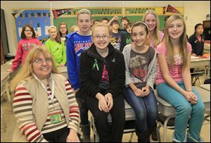 Teacher Mary McCoy, left, with her 