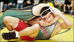 Central Catholic's Nate Hagan, right, works free from Clay's Brian Henneman in the 126-pound final. Hagan won 9-4.