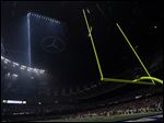 Half the lights are out in the Superdome during a power outage with 13 minutes, 22 seconds left in the third quarter of Super Bowl XLVII on Sunday in New Orleans.