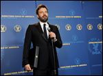  Ben Affleck speaks holds his award for outstanding directorial achievement in feature film for 