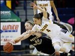  UT's Naama Shafir, right, who had 14 points and nine assists, battles Western Michigan's Alex Morton.