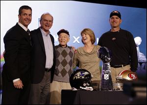 The Harbaugh family, including, from left, Ravens coach John, father Jack, grandfather Joe Cipiti, mother Jackie, and 49ers coach Jim, gathers during Super Bowl week in New Orleans.