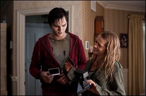Nicholas Hoult, left, and Teresa Palmer in a scene from 