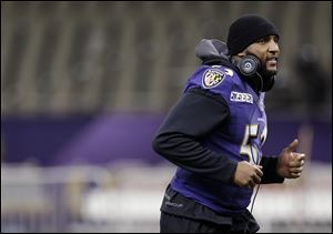 Baltimore Ravens linebacker Ray Lewis jogs during an NFL Super Bowl XLVII walkthrough on Saturday in the Mercedes-Benz Superdome in New Orleans. 