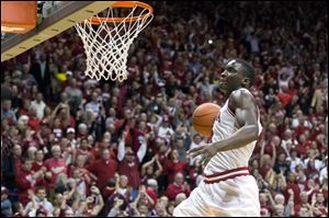 Indiana's Victor Oladipo drives toward the basket for a slam dunk during the second half Saturday in Bloomington, Ind.