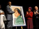  Councilwoman Joann Watson, from left, Lloyd Wesley, Jr., Detroit postmaster,  Elaine Eason Steele, co-founder of the Rosa and Raymond Parks Institute for Self Development, and Sen. Carl Levin applaud at the unveiling of the Rosa Parks' 100th birthday commemorative postage stamp at the Museum of African American History in Detroit today.