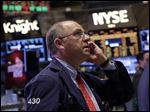  Trader Frederick Reimer works on the floor of the New York Stock Exchange, Friday, Feb. 1, 2013. Evidence that the U.S. economic recovery is firmly on track drove markets higher on Friday, adding to the cheer from good economic indicators out of Europe. (AP Photo/Richard Drew)