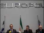  Britain's Rob Wainwright, second from left, director of the European police agency Europol, elaborates on findings of a probe into match fixing during a press conference in The Hague, Netherlands.