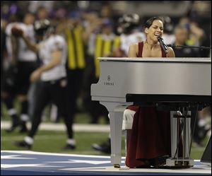 Alicia Keys sings the national anthem before the Super Bowl.