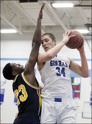 Anthony Wayne's Mark Donnal tries to get around Whitmer's Nigel Hayes during a nonconference game on Tuesday night at Anthony Wayne High School. Donnal scored 15 points and grabbed 10 rebounds, while his future Big Ten rival scored 16 and hauled down seven boards.