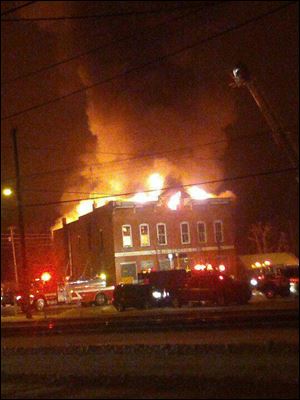 Three people died in a fire that engulfed the Old Antique Store in Harpster, Ohio, early today.